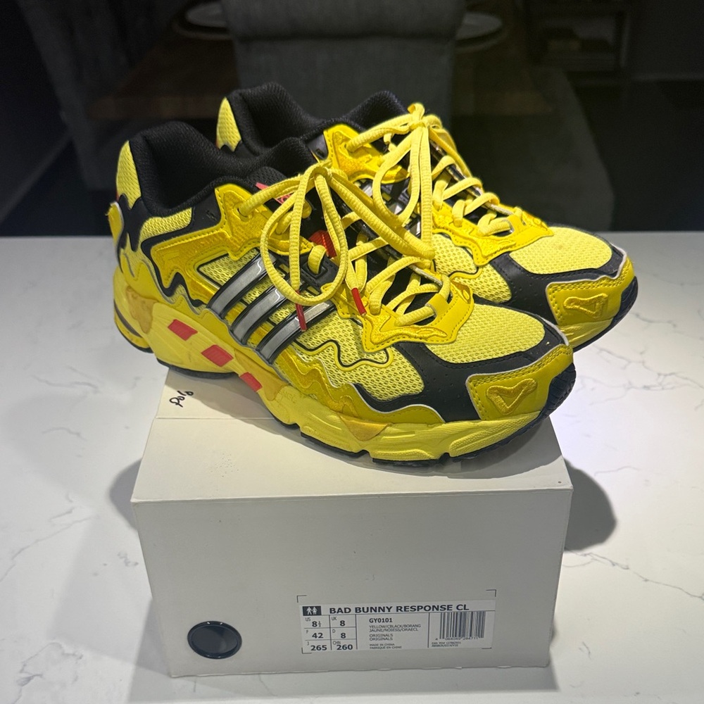 Vibrant Yellow and Black Sneakers
Bad bunny